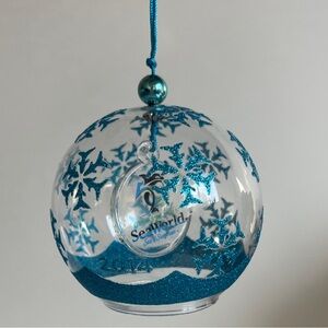 Sea World 50th Anniversary Sea of Surprises 2014 Blue Glitter Glass Ornament